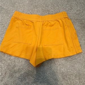 Calia by Carrie Underwood elastic waist shorts size Medium Yellow Gold EUC